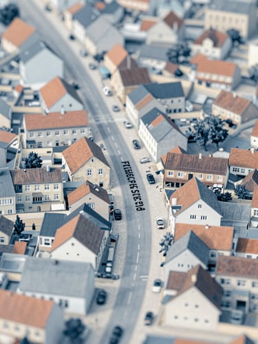 Map of Flensburg-Friesischer Berg, showing Friesische Str. 84, with a focus on the street and surrounding buildings, soft natural daylight, muted blue and sand tones.