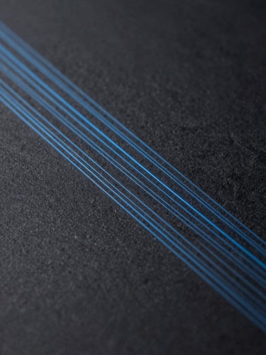A high-fidelity minimalist UI wireframe with thin blue glowing lines, dark slate background, extreme close-up, sharp technical precision