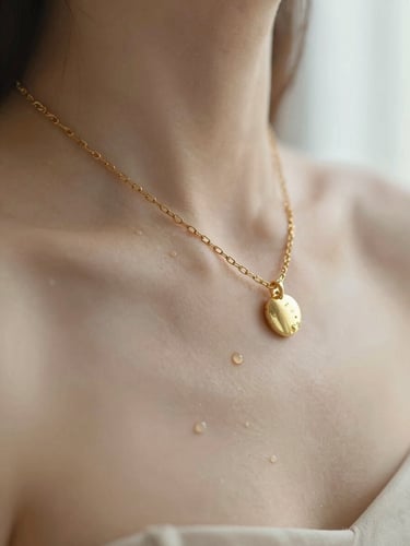 Macro photography of an 18K gold-plated chain draped over a collarbone, water droplets glistening on the metal, soft morning light.