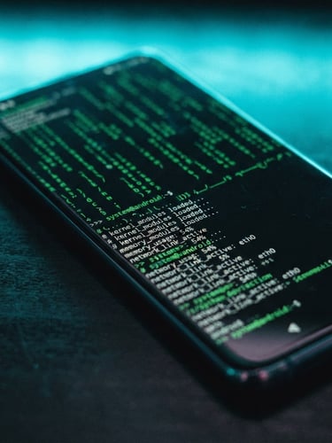 Angled mockup of an Android flagship displaying a high-contrast terminal interface with electric green text, dark glass surface, moody neon cyan backlighting, macro lens focus.