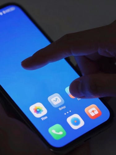 Tight macro shot, vibrant electric blue screen glow, a physical hand gesturing over a modern Android screen displaying a fluid custom launcher interface, dark studio setting