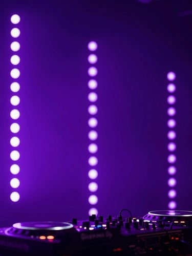 Close-up of professional DJ equipment and vertical LED lighting arrays glowing in deep purple, atmospheric haze, concert lighting setup, 35mm lens