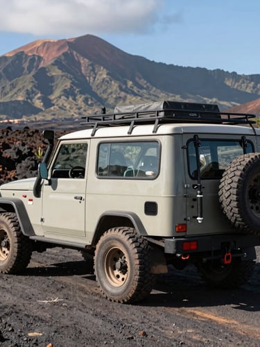 A rugged 4x4 field fleet vehicle parked on volcanic gravel terrain with hydrologic testing rigs mounted on the back, bright Hawaiian sun, mountains in the background.
