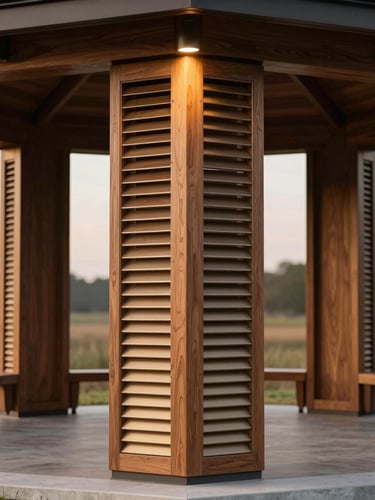 A straight-on medium shot of a custom-milled oak gazebo column, showing the seamless integration of motorized bronze louvers and concealed ambient downlighting, dusk light