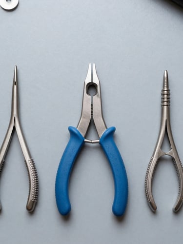 Top-down flat lay of precision computer repair tools on a clean slate gray workbench, cool daylight, high detail