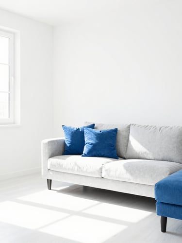 Bright high-key interior photography of a modern spotless living room with crisp natural daylight, clean white and blue tones, sharp focus.
