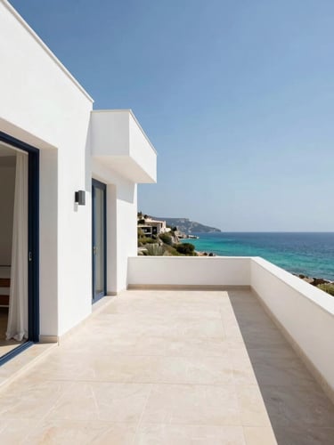 Bright architectural wide shot of a modern white villa terrace overlooking the turquoise sea of Villasimius, warm Mediterranean light, minimalist layout