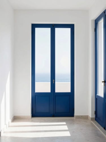 Minimalist modern apartment interior in Cagliari, bright white walls, elegant navy blue details, large window with soft sunlight