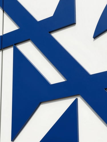 Close-up of premium CNC-milled MDF panels with geometric patterns, bright daylight highlighting the crisp blue and white corporate finish, architectural precision.