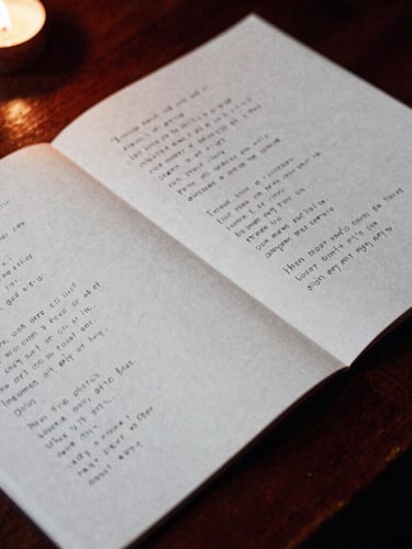 Close-up of handwritten lyric sheets on textured paper, resting on a dark wooden table in deep twilight shadow, illuminated by a single candle flame, cinematic 35mm film grain.