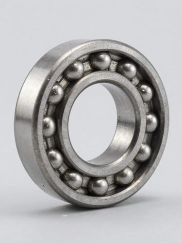 Macro high-contrast shot of a pristine steel bearing, sharp metallic reflections, industrial gray background, clean studio lighting