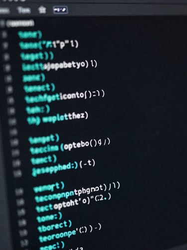 Macro shot of a dark IDE interface with clean code blocks, glowing cyan syntax highlighting, soft keyboard background, low-key ambient lighting