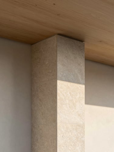 Minimalist architectural detail of a travertine stone column meeting a raw oak ceiling, soft morning light, shadow play, clean lines, editorial architectural photography