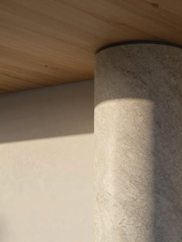 Extreme close-up of a minimalist travertine marble column meeting a raw oak ceiling, soft morning light casting long shadows, architectural detail