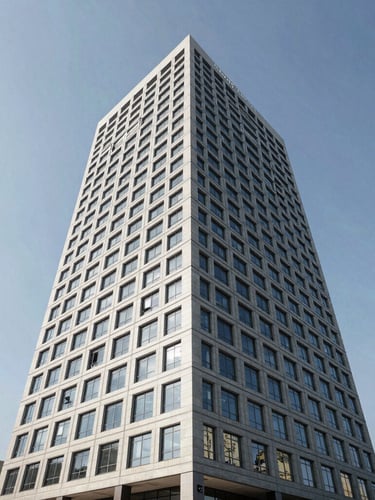 Wide-angle architectural view of a modern commercial office tower in Lusaka, sharp daylight, clean lines, professional atmosphere.