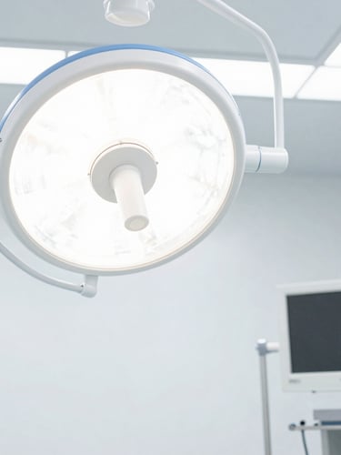 Bright high-key clinical photography of a modern sterile operating room, a high-precision surgical tower on the right, crisp studio light, sharp macro focus.