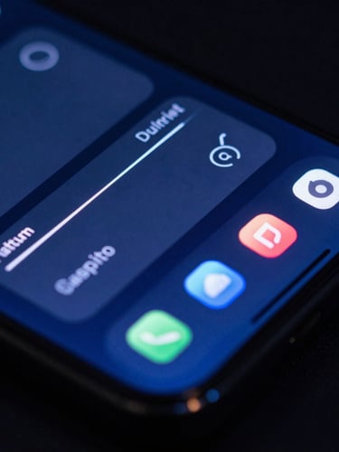 Moody dark-mode close-up of a high-fidelity mobile device mockup displaying a clean dashboard interface, glowing screen reflections, deep blues and electric neon accents, macro lens, shallow depth of field