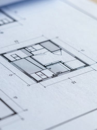Macro close-up of physical architectural blueprints and technical wireframes on a screen, bright daylight, cool blue tones, sharp focus