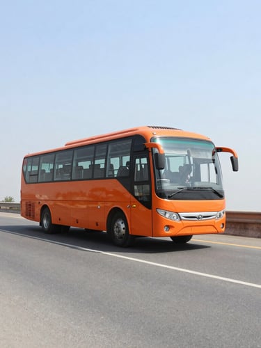 Wide-angle crisp 35mm photo of a modern orange intercity sleeper bus driving on a clean Indian highway under bright daylight, negative space on the left