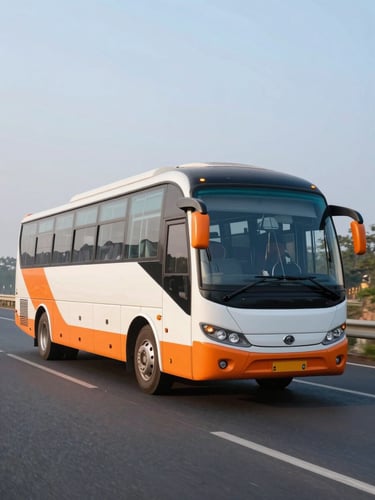 A modern intercity sleeper bus driving on a clean Indian highway at sunrise, sharp focus, vibrant orange accents, 35mm photography