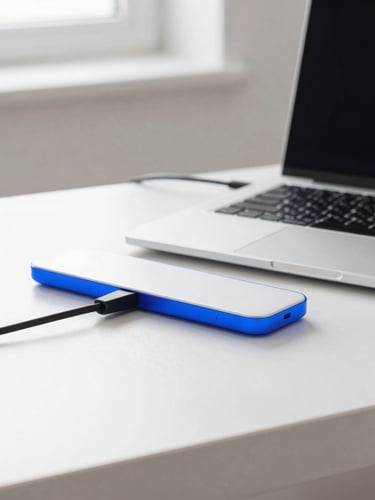 A clean modern home office desk, bright natural daylight, neatly routed cables under a sleek laptop, electric blue accent light, sharp focus, 35mm