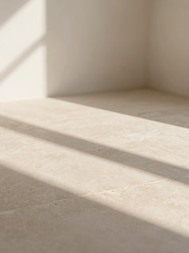 Abstract geometric shadows on a warm sand stone surface, elegant minimalist composition, soft diffused natural light, 35mm