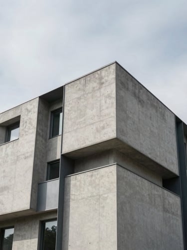 Crisp architectural elevation of a modern concrete and steel facade under cool overcast daylight, sharp geometric shadows, wide-angle lens