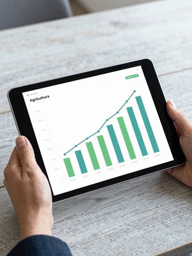 A modern tablet showing agricultural growth charts, held by hands over a clean rustic desk, bright daylight, professional editorial style.