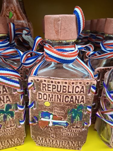 Mamajuana bottle souvenir with Dominican Republic label and ribbon in Punta Cana