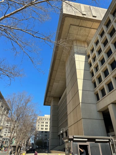 The FBI building, a large concrete building with sharp corners
