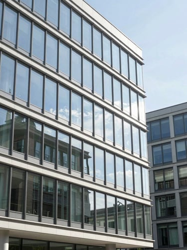 Modern Swiss architectural details of glass and steel office building in Zurich, bright natural daylight, sharp focus