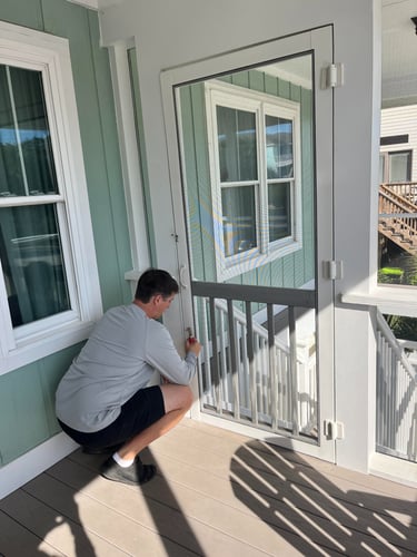 technician installs fiberglass screen in Mount Pleasant home. 