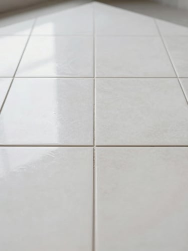Close-up of perfectly aligned premium porcelain tiles, clean work site, soft natural light reflecting on smooth surfaces, architectural detail, 35mm