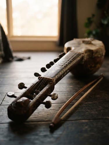 A close-up of a traditional dilruba instrument resting on a dark wooden floor, soft morning light filtering through a window, shallow depth of field, 35mm photography.