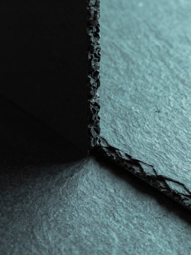 High-contrast architectural structure with sharp geometric shadows, cool minimalist aesthetic, slate and teal tones, macro lens