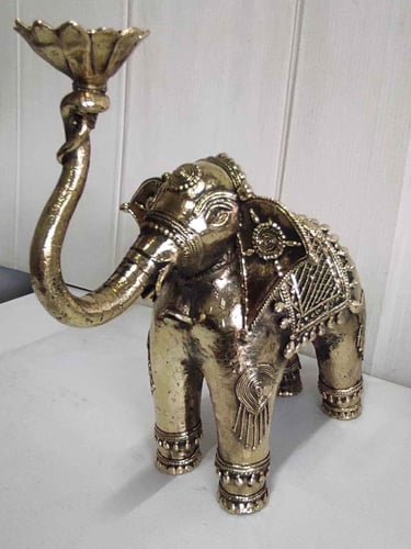 "Designer brass elephant with lotus in upward trunk and tribal carvings, left side-Export-oriented"