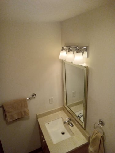1/2 bath vanity sink and mirror lighting