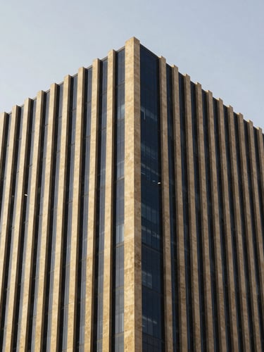 An architectural crop of a modern corporate office building in Casablanca with sharp lines, bright natural daylight, and soft shadows.