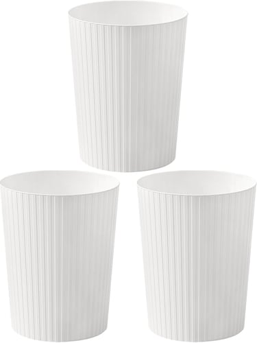 three white pleated paper cups with pleated plea
