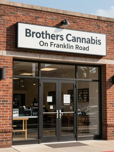 Bright natural daylight shot of the clean, professional brick storefront of Brothers Cannabis on Franklin Road, with a clear sign and welcoming entrance.