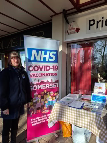 NHS Cancer awareness stand with leaflets
