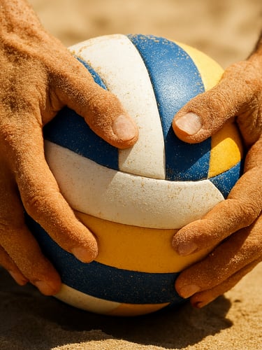 Dynamic close-up of sand-covered hands gripping a volleyball, bright outdoor sunlight casting sharp shadows, shallow depth of field