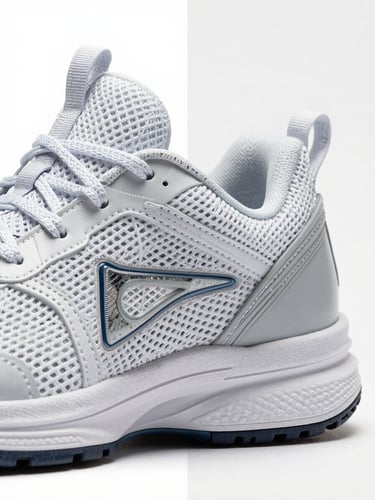 High-zoom detail of a complex mesh athletic shoe being isolated, vector pen tool paths visible, sharp studio lighting, neutral background.