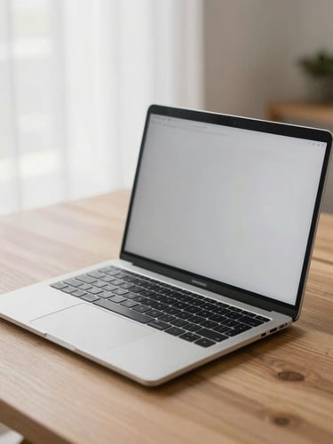 A pristine space gray MacBook Pro open on a clean wooden desk, bright natural morning light, shallow depth of field