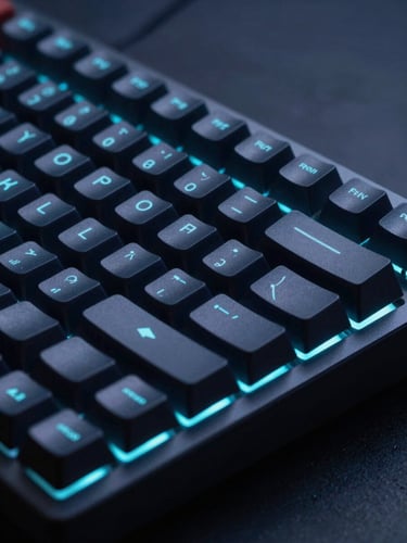 Sleek close-up of a mechanical keyboard with subtle cyan backlighting, dark keycaps, clean minimalist tech aesthetic, low-key studio lighting