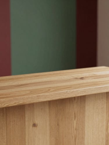 Soft daylight illuminating a cozy Scandinavian-style reception desk, textured details, warm wood, 35mm