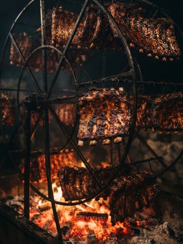 Dramatic low-key food photography, a massive custom metal rib Ferris wheel rotating slowly over glowing red acacia wood embers, rich golden light reflecting off caramelized meat crust, dark background.