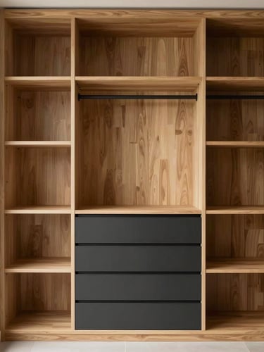 Straight-on architectural shot of a minimalist walk-in wardrobe, warm oak shelving, seamless charcoal drawers, bright natural daylight, 35mm