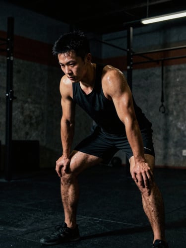 Sweat-glistening athlete mid-motion during a high-intensity training session, dark industrial gym setting, dramatic key light, deep shadows, intense saturated tones, raw cinematic grain, 35mm