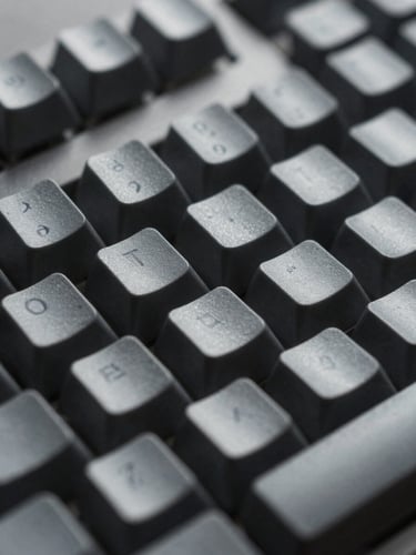 Macro shot of a high-end mechanical keyboard with dark grey keycaps, soft cool diffused studio lighting, shallow depth of field